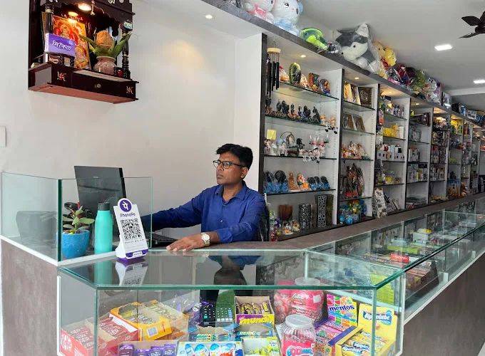 Person sitting at Retail Billing Counter at retail store in Pune