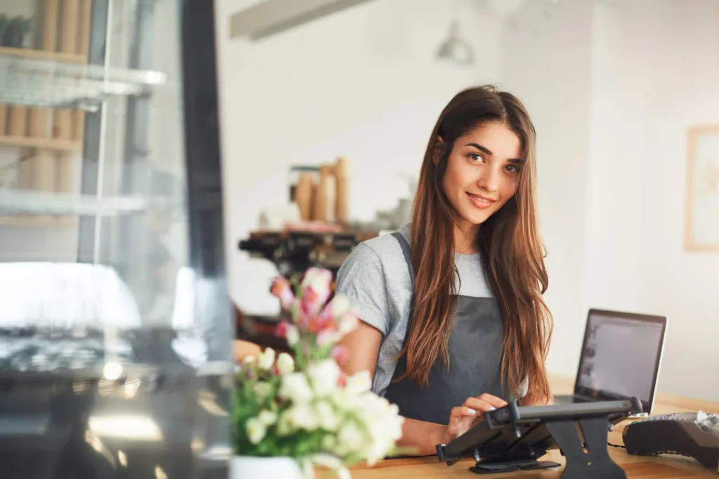Retail Store Owner Using POS Software -- Billing Software at her Store